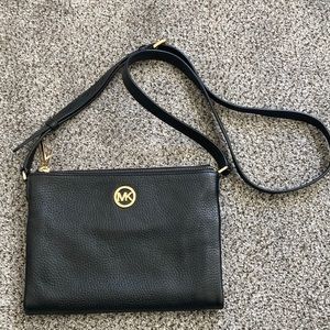 Michael kors black purse. Never been used.